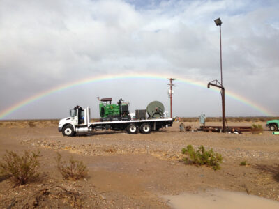 Rainbow behind WellJet truck.
