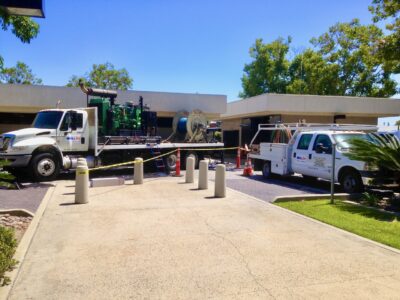 WellJet trucks outside building where well is situated.